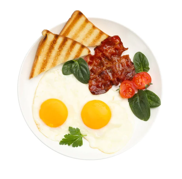 Yağda yumurta, pastırma, ıspanak, domates ve ekmek dilimleri ile nefis bir kahvaltı.