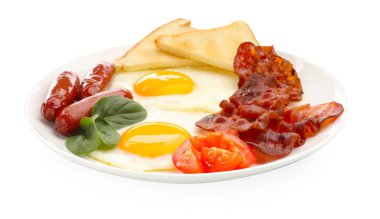 Yağda yumurta, sosis, pastırma, domates, ıspanak ve ekmek dilimleriyle nefis bir kahvaltı.