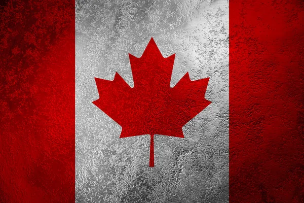 Arka planda akçaağaç yaprağı olan Kanada bayrağı
