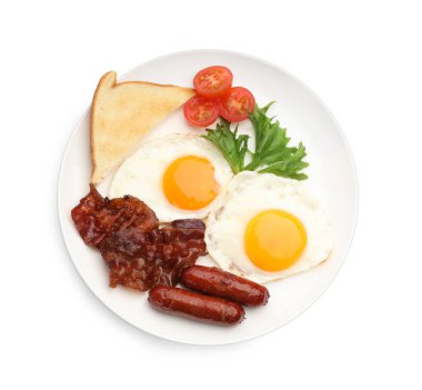 Delicious breakfast with fried eggs, sausages, bacon, toasted bread and tomatoes isolated on white, top view