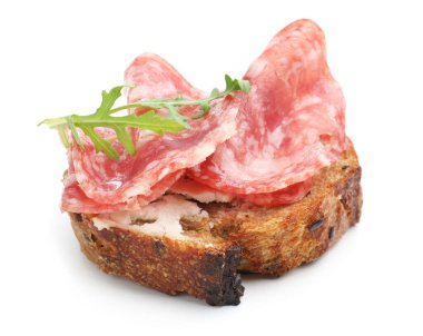 Salamlı, krem peynirli ve roka soslu nefis bir bruschetta.