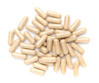 Beyaz, üst görünümde izole haplar yığını