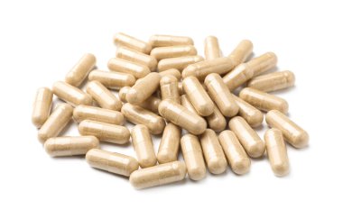 Beyaza izole edilmiş bir sürü hap.