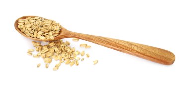 Tahta üzerinde beyaz izole kaşık yulaf gevreği