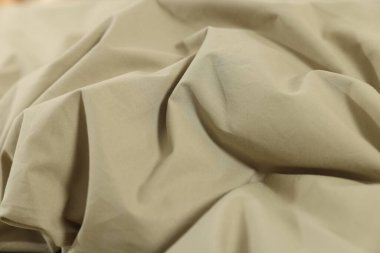 Temiz zeytin pamuklu çarşaflar arka plan olarak, yakın plan