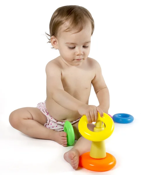 Baby playing with rings toy Stock Picture