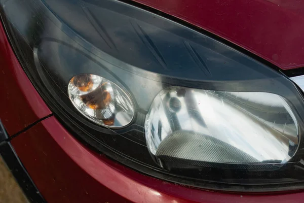 Große Autoscheinwerfer Nahaufnahme Technische Straßenbeleuchtung Tag Und Nacht Farbige Front — Stockfoto