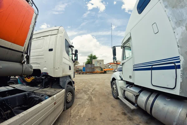 Old trucks are on base before leaving for a long-haul flight — Stock Photo, Image