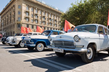 Exhibition of retro cars produced in the USSR on the forecourt i clipart