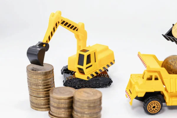 Yellow Toy Bulldozer Builds Road Out Dollar Bills — Stock Photo, Image