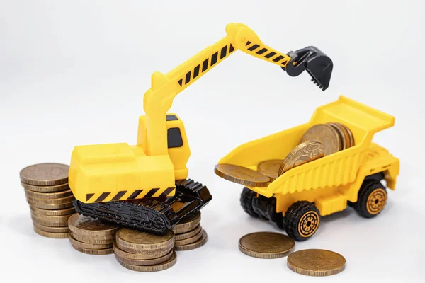 Toy Construction Excavator Loads Money Back Toy Truck — Stock Photo, Image