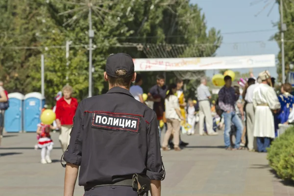 Police outfit keeps order and security during the celebration of city day — Stock Photo, Image