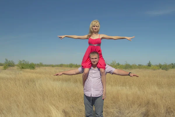 A couple in love forms the pyramid — Stock Photo, Image