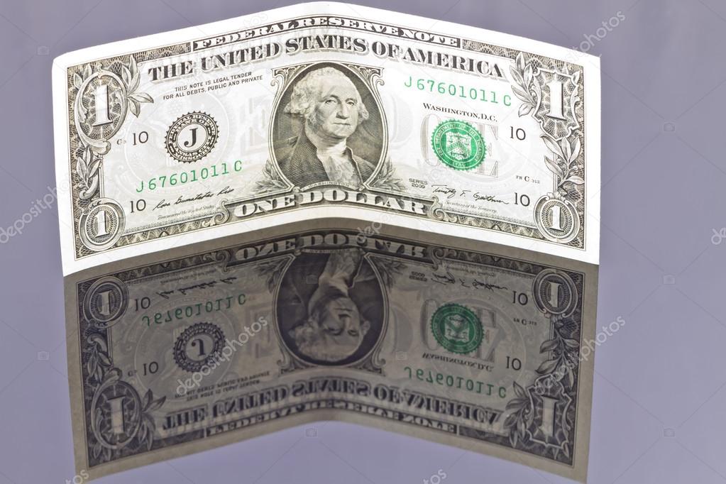 Banknote one dollar with your own reflection
