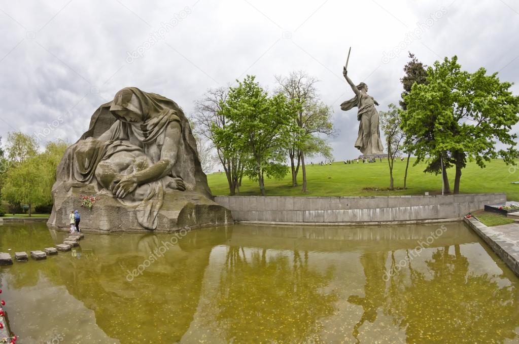 Sculpture of a Grieving Mother and a swimming pool 