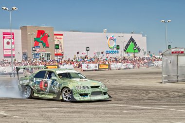 Drift car team X-Round enters the bend with slip