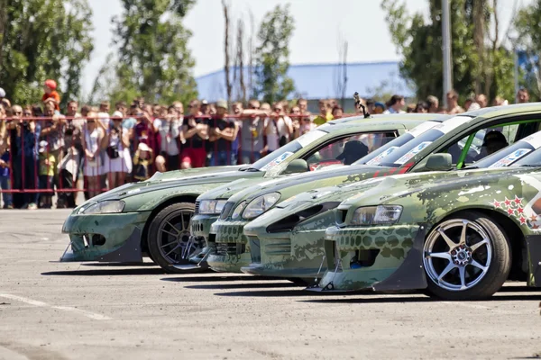 Auto team x-ronde gestileerde militaire onderwerpen — Stockfoto