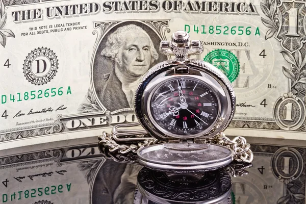 Pocket watch where the arrows show 8-00 and the dolla — Stock Photo, Image