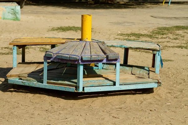 Old carousel with cracked boards — Stock Photo, Image