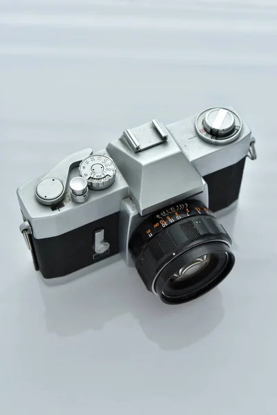 Classic camera on white background.