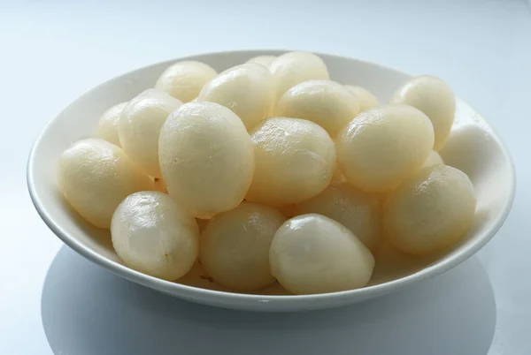 Rambutan Een Witte Plaat Een Witte Achtergrond — Stockfoto