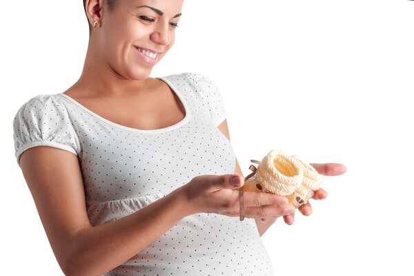 милая беременная девушка в белом платье в горошек
