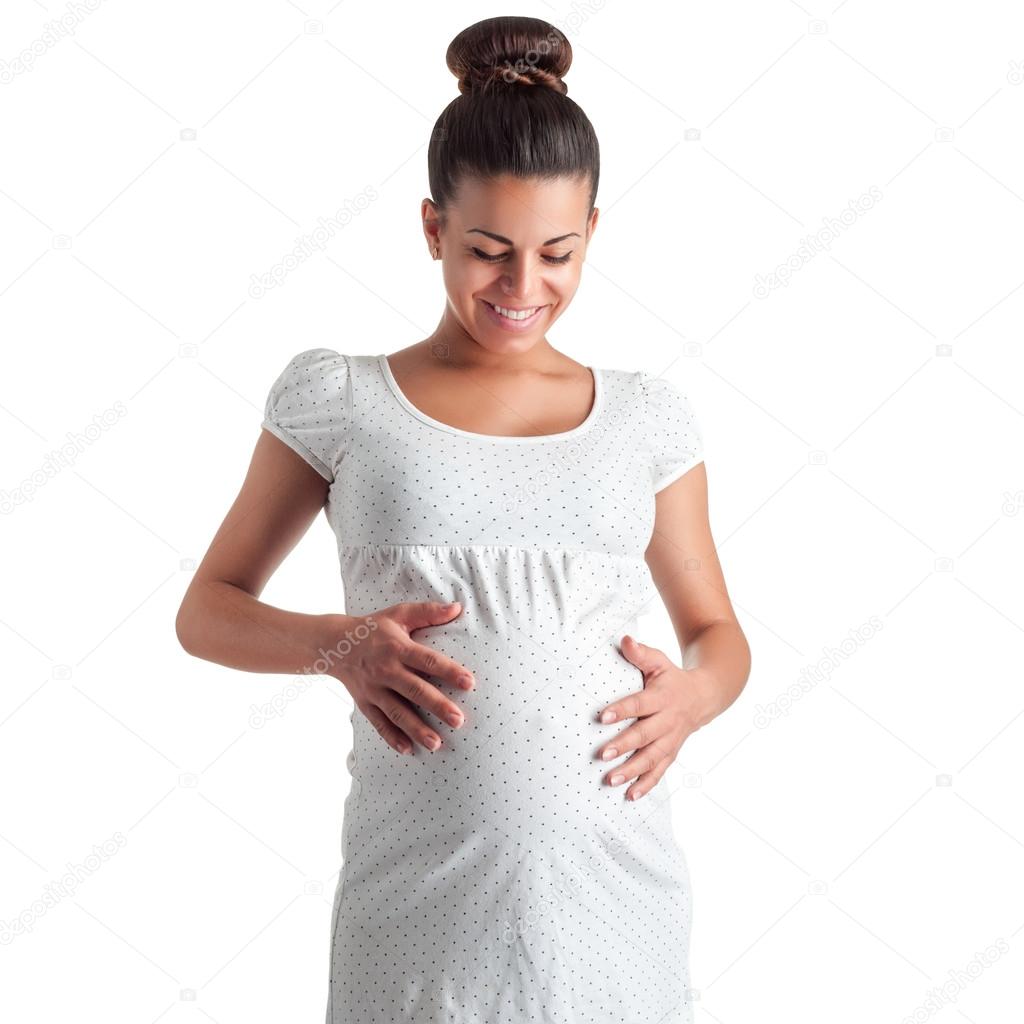 cute pregnant girl in white dress in polka dots