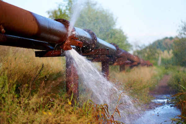 Leakage of water from an industrial water pipe.