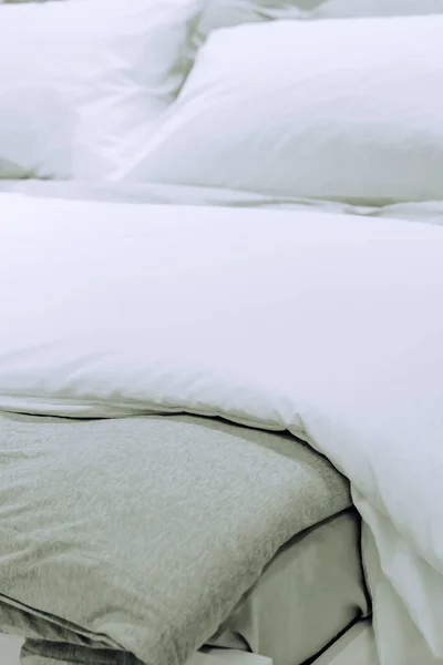 Close up image of Bed mattress Duvet with pillow and blanket