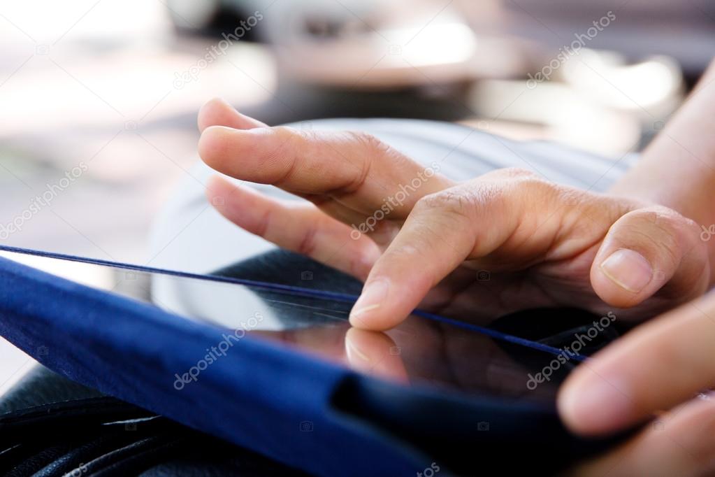 Woman using digital tablet