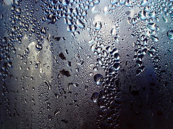 Water drops on metal surface.