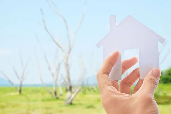 Ikonenhaus in der Hand — Stockfoto