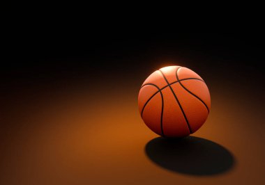 Siyah arka planda turuncu ışık yansıyan basketbol topu.