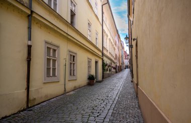 Prague, Czech Republic, August 9, 2023. A charming cobblestone alley in the Old Town. Perspective view. Travel destinations.