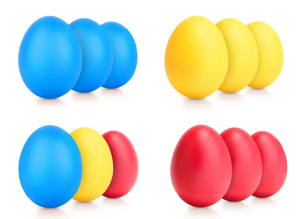 Concepto de huevos multicolores de Pascua en blanco — Foto de Stock