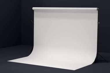 Arkaplanda profesyonel ışıklandırma ekipmanları ve fotokopi alanı olan 3D fotoğraf stüdyosu.