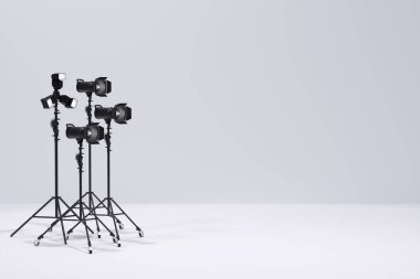 Photography studio flash on a lighting stand isolated on white background with curtain. 3D rendering and illustration of professional equipment like monobloc or monolight clipart
