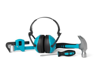 Top view of green construction tools for repair and installation on white