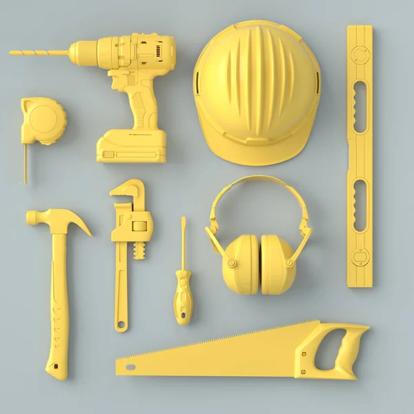 Vue de dessus des outils de construction monochromes pour la réparation sur gris et jaune — Photo