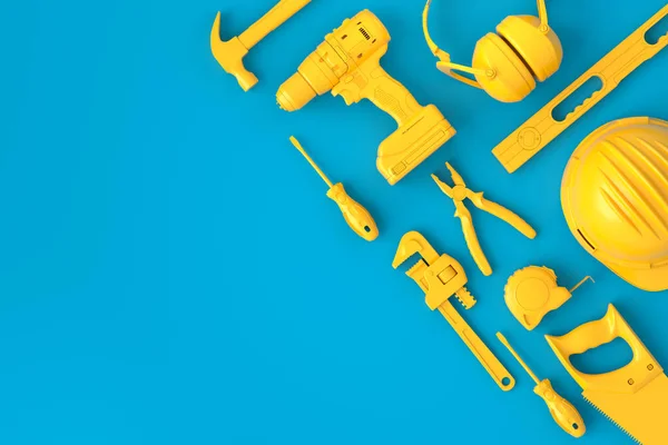 Κάτοψη μονόχρωμων εργαλείων για επισκευή σε μπλε και κίτρινο — Φωτογραφία Αρχείου