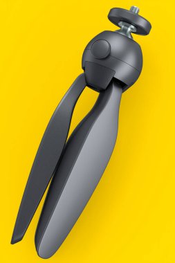 Sarı arka planda izole edilmiş hızlı yayın plakalı fotoğraf ve video tripod. Profesyonel fotoğrafçılık ekipmanlarının 3B görüntülenmesi ve çizimi