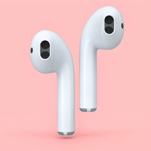 Wireless white headphones isolated on pink background — Stock Photo, Image