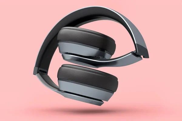 专业的银色游戏耳机在粉色背景下隔离 过度耳机的3D渲染和音乐设备的概念 — 图库照片
