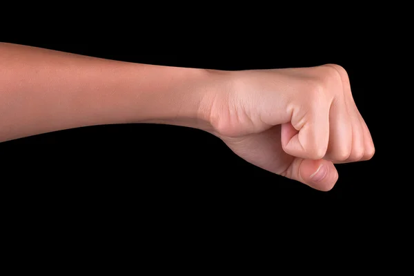 Powerful fist pump against black background — Stock Photo, Image