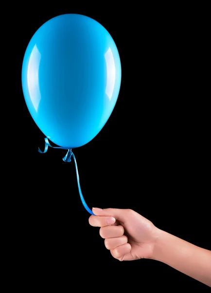 Летящие воздушные шары с изолированной рукой — стоковое фото