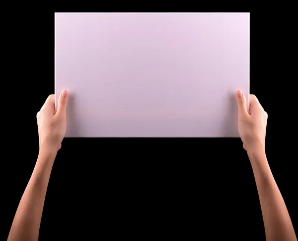 Büyük boş kağıt afiş tutan eller — Stok fotoğraf