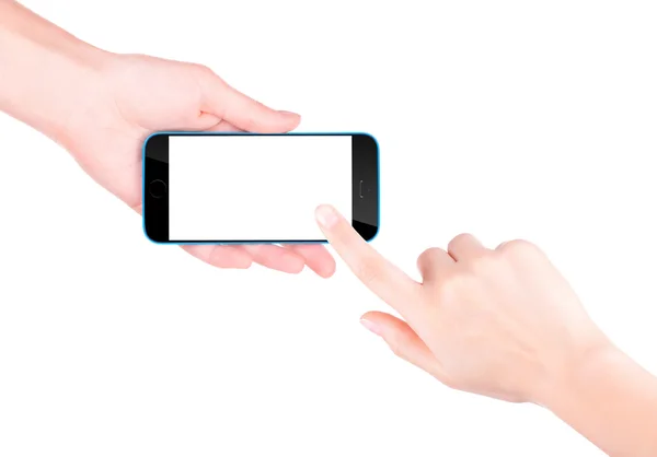 Рука тримає чорний смартфон з порожнім екраном — стокове фото
