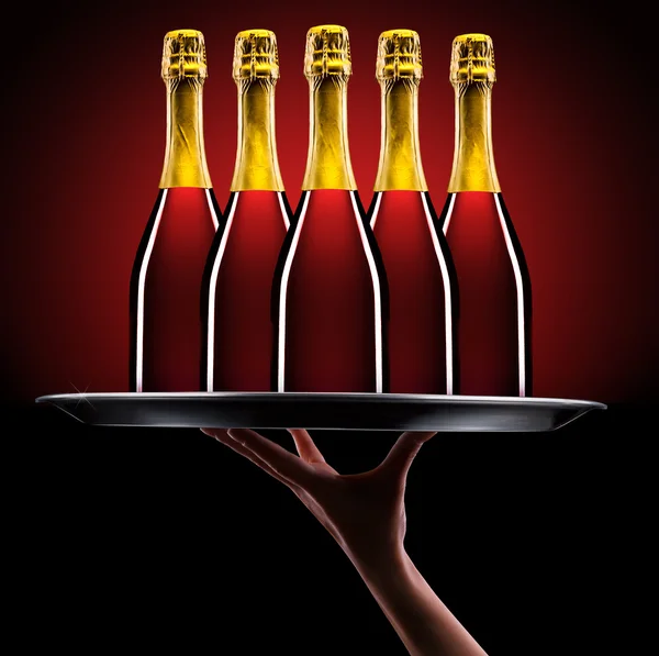 Kellnerhand mit Champagner — Stockfoto