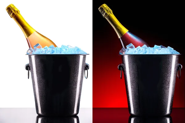 Botella de champán en cubo de hielo — Foto de Stock
