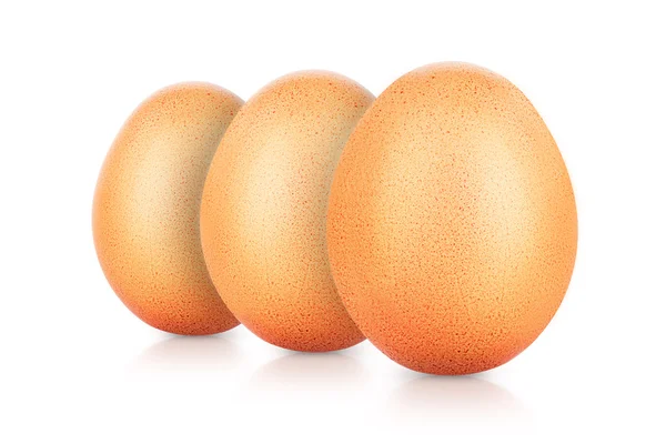 Yellow chicken eggs on a white — Stock Photo, Image